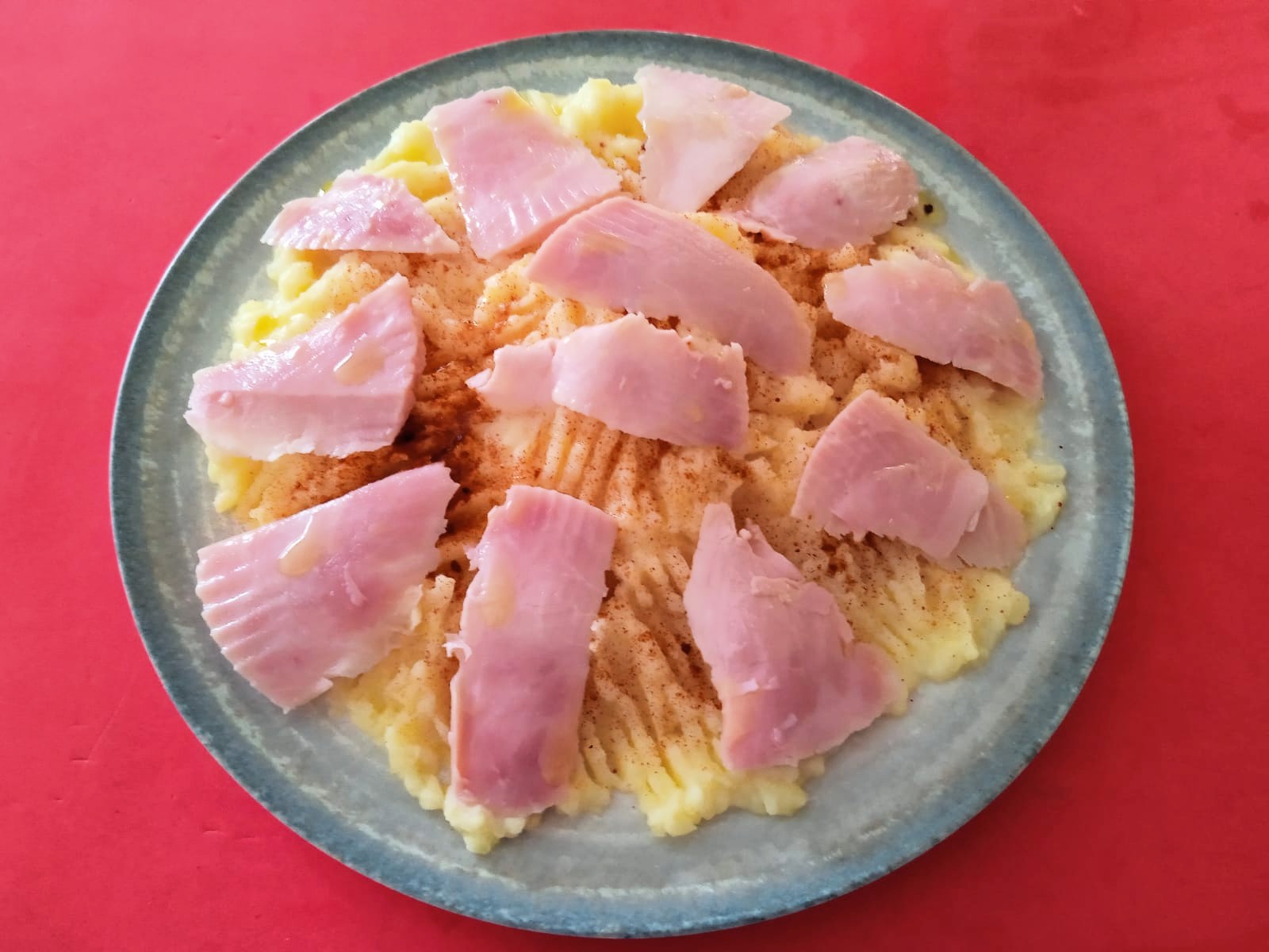 Lacón con parmentiere a la naranja