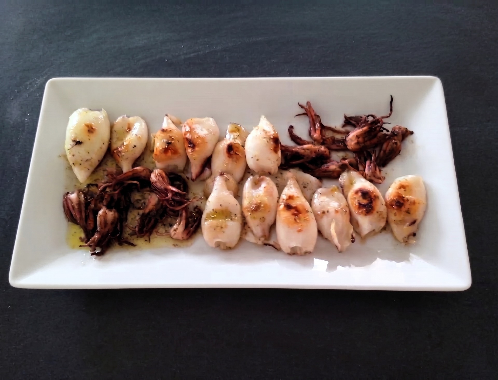 Chipirones a la plancha con perejil y limón